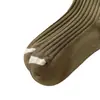 Calcetines de diseñador Luokou de color contrastante de moda para mujer, calcetines nuevos de otoño e invierno de longitud media hasta la pantorrilla, calcetines japoneses simples con letras estampadas en caliente y de canalé