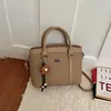 Bolso de mano de alta gama para mujer 2026 nueva moda bolso de hombro simple bolso cruzado versátil bolso tipo cubo casual para mujer