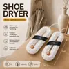 Secador de zapatos, máquina secadora de zapatos, calentador de zapatos, secador de zapatos doméstico temporizado desodorizante, calentador de zapatos exportado a Rusia