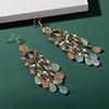 Pendientes de borlas con cuentas de colores exóticos de estilo étnico retro bohemio para mujer, nuevos pendientes Explosions 2024