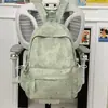 Mochila Tie-Dye Simples e Estilosa Estilo Coreano Modelo Novo 2026 Mochila Escolar de Grande Capacidade para Alunos do Ensino Fundamental e Médio Mochila para Computador