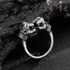 Fabricantes de joyería estilo rock hip-hop lote directo de retro europeo y americano hacer viejo personalidad puño doble anillo de titanio para hombre