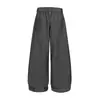 Pantalones casuales plisados de estilo americano para calle, fluidos, con diseños de moda, bolsillos únicos, color liso y corte holgado de pierna ancha para hombre.