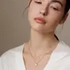 Collar de Diamante Ovalado Midnight Sip para Mujer - Lujo Ligero, Nicho, Moda de Alta Gama, Elegante, Para el Trabajo, Cadena para Clavícula con Diamante Flotante