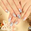 Uñas Portátiles de Navidad Copo de Nieve Amor Brillo Manicura Uñas Postizas Cortas Almendra Mariposa Uñas Largas Europeas y Americanas Venta al por Mayor
