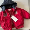 Chaqueta de Algodón con Capucha para Niñas 2025 Otoño e Invierno Nueva Elegante Dibujos Animados Abrigo de Algodón Ropa de Abrigo Engrosada para Bebé