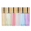 Botella de vidrio con roller de 10 ml de color para venta al por mayor, botella go ball, botella de vidrio, botella vacía, botella para aceite esencial, botella de perfume de vidrio, botella