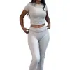 Conjunto casual de dos piezas para mujer, superventas transfronterizo europeo y americano, para entrenamiento: conjunto deportivo de camiseta de cuello redondo y pantalones acampanados de tiro bajo