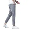 Jeans de Tencel de Ponta Hong Kong para Homens 2026 Novo Outono Ultra-Fino Reto Slim-Fit Seda de Gelo Calças Casuais