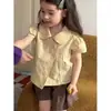 Camisa de Verão Feminina Estilo Francês 2026 Novo Estilo Infantil Estampa de Bolinhas Design Único e Bonito Gola Boneca Camisa para Bebê