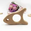 Suministro directo de fábrica palo para morder dientes de bebé Madera de haya diente calmar forma de animal palo para morder dientes morder música