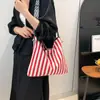 Bolsa de Lona Listrada Vertical Super Popular Estilo Coreano para Mulheres 2025 Nova Bolsa de Mão Literária Retrô de Grande Capacidade para o Dia a Dia