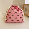 Bolsa de tela de algodón con cordón y estampado de lazo bolsa de almacenamiento para viajes clasificación en casa bolsa de algodón al por mayor