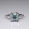 Deseo Nueva oferta especial Anillo de princesa con topacio europeo y americano, anillo de compromiso con diamante azul cuadrado, accesorios de mano para mujer