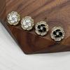 Botón de metal con punta de aceite en forma de flor de moda con incrustaciones de diamantes, estilo Chanel, para suéter, camisa, cárdigan, hebilla, prenda superior, joyería, hebilla