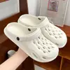 Fabricante Atacadista de Crocs de Dinossauro Sapatos de Jardim Femininos e Masculinos Casal Pai-Filho Sapatos de Praia Sandálias e Chinelos Estilo Coreano Antiderrapante Baotou