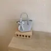 Bolsa de mão da moda e super popular para comércio exterior, nova bolsa versátil feminina primavera-verão 2026, bolsa transversal com toque de luxo, bolsa de mão pequena