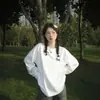 Camiseta Blanca de Manga Larga de Alta Gama para Mujer Algodón Puro 2026 Nuevo Artículo Artículo Popular Principios de Otoño Estilo Holgado Perezoso Prenda Base