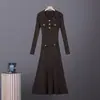 Vestido de malha feminino de comprimento médio com gola polo e saia evasê transfronteiriça 2026 Europeu e Americano ajustado na cintura