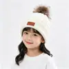 Fornecimento Especial Transfronteiriço Outono e Inverno Novo Chapéu de Tricô com Pom-pom para Crianças Aquecimento ao Ar Livre Proteção contra Frio Aba Rebatida Chapéu de Lã Chapéu para Frio