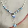Collar con colgante de campana de mariposa de cerámica de estilo étnico retro para mujer, diseño nuevo y moderno, cadena larga para suéter, accesorios