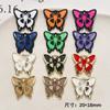 Diablo retro creativo color de goteo de aceite mariposa cinturón colgante aleación accesorios diy aretes colgante de pelo material al por mayor