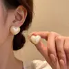 Pendientes coreanos retro de alta gama, diseño de nicho, forma cuadrada, forma de corazón simple, estilo geométrico ecológico y versátil