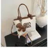 Bolso de Mano Tipo Cesta de Verduras Nuevo de Invierno Transfronterizo para Mujer 2025 Bolso de Hombro de Gama Alta de Moda Versátil para el Trabajo Bolso Cruzado