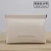 Bolsa de metralla cerrada simple mini bolsa de almacenamiento para audífonos de PU color caramelo monedero monedero bolsa de almacenamiento para labiales