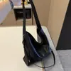 Bolsa de ombro simples e versátil em couro de vaca para mulheres, bolsa tote de grande capacidade para o dia a dia, bolsa de axila de alta qualidade, nova bolsa feminina 2026