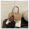 Bolso tejido de alta gama para mujer, nuevo bolso tipo almohada vintage de nicho 2026, bolso de hombro y cruzado casual para el trabajo y el día a día para mujer