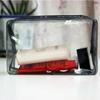 Bolsa de almacenamiento de viaje de alta calidad, bolsa de lavado de PVC, bolso de mano para cosméticos de mujer, bolso impermeable transparente portátil para viajes de negocios.
