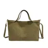 2026 Nova Bolsa de Ombro Único com Textura de Tecido Feminina Retrô para o Dia a Dia Bolsa Tote de Grande Capacidade Versátil para Mão ou Transversal