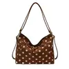 Lona transfronteriza 2026 nueva moda elegante bolsa de hombro de gran capacidad con lunares estilo coreano informal para el día a día bolso de axila moderno
