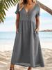 Vestido informal de verano 2024 con cuello en V, manga corta y bolsillos de color liso para mujer europea y americana.