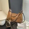 Bolsos de Gamuza de Nicho Más Vendidos en Otoño e Invierno 2025 Nuevo Bolso Cruzado Versátil para el Trabajo Bolso de Hombro para Mujer