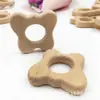 Suministro directo de fábrica palo para morder dientes de bebé Madera de haya diente calmar forma de animal palo para morder dientes morder música