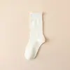 Meias femininas de altura média Zhuji, para primavera e verão, cor sólida, respiráveis, confortáveis, estilo slouch, para outono e inverno, sem costura, caimento solto, de algodão pós-parto para mulheres