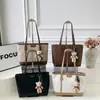 Bolso tote para mujer, moda coreana, gran capacidad, bolso casual para el hombro, patrón tejido primavera/verano 2026, bolso de hombro de nicho de moda para mujer