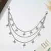 Corrente de Cintura de Metal com Estrela de Quatro Pontas em Gradiente de Quatro Camadas, Corrente Corporal Decorativa Versátil para Calças Pretas e Saias Curtas de Meninas Descoladas