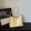 Bolsa Casual da Moda com Personalidade, Novo Estilo Primavera 2026, Textura Simples, Bolsa de Ombro Único Transversal, Bolsa Tote de Nicho Feminina