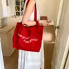 Bolsa de Lona Estilo Coreano Estilo Preguiçoso 2025 Nova Bolsa de Grande Capacidade Feminina Casual Versátil Bolsa Tote para Estudante Universitário