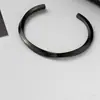 2023 Pulsera tejida retorcida abierta retro europea y americana Pulsera chapada en cobre y plata Pulsera geométrica para hombre venta al por mayor