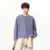 Sudadera versátil de color liso con cuello redondo para hombre, camiseta de manga larga de corte holgado para primavera y otoño, nuevo estilo 2026, top básico para capas, moderno