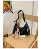 Bolso de hombro para mujer a la moda estilo coreano, nuevo modelo primavera 2026, nicho casual y elegante para el día a día