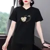 Moda Feminina Plus Size Verão 2026 Novo Estilo Camiseta Regular de Ombro com Manga Curta, Top Elegante Versátil Tendência com Gola Redonda e Manga Meia-Manga