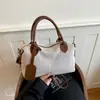 Bolso de hombro grande de estilo europeo y americano, tipo soft-shell, de gran capacidad, 2026, nuevo, bolso cruzado moderno y versátil para el trabajo, bolso de mujer