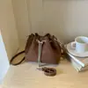 Bolso tipo cubo transfronterizo de lujo ligero, color sólido, versátil, casual, personalidad, para mujer, textura de alta calidad, temperamento, nuevo, elegante, a la moda, cruzado