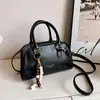 Bolso tipo almohada de mano de alta gama a la moda 2026 otoño transfronterizo nuevo bolso de hombro casual simple bolso cruzado de moda para el día a día