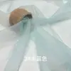 Tela de Organza 2020D Hilo Ruyi Mate Transparente Ligeramente Rígida Accesorios de Encaje Bordado Tela para Empaque de Regalos